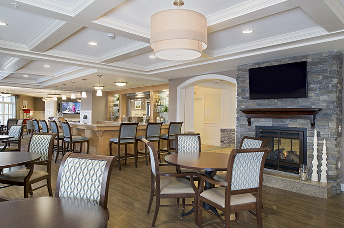 Brightview Arlington Dining Room with Fireplace - Massachusetts Senior Living