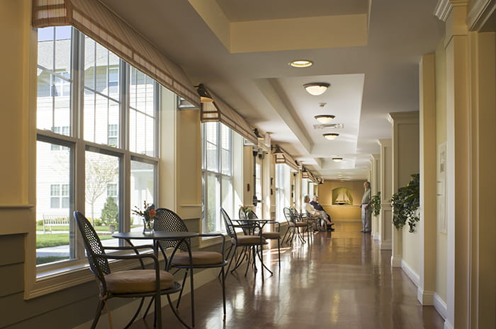 Brightview Commons Hallway with Seating Area - Rhode Island Senior Living