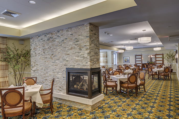 Brightview Woodburn Dining Room Fireplace - Virginia Senior Living