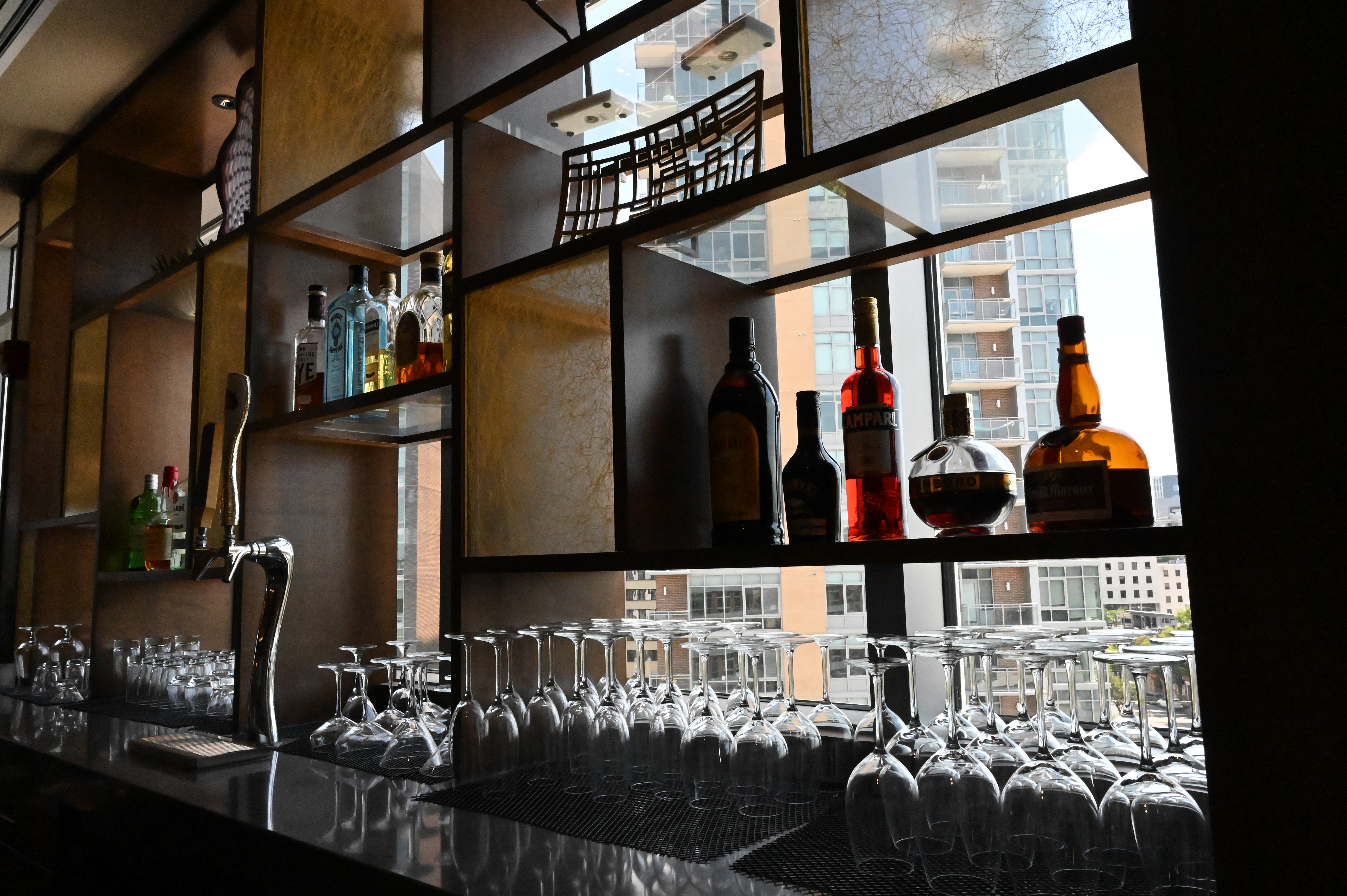A shot of the back of the bar at Brightview Woodmont where social hour is held every day