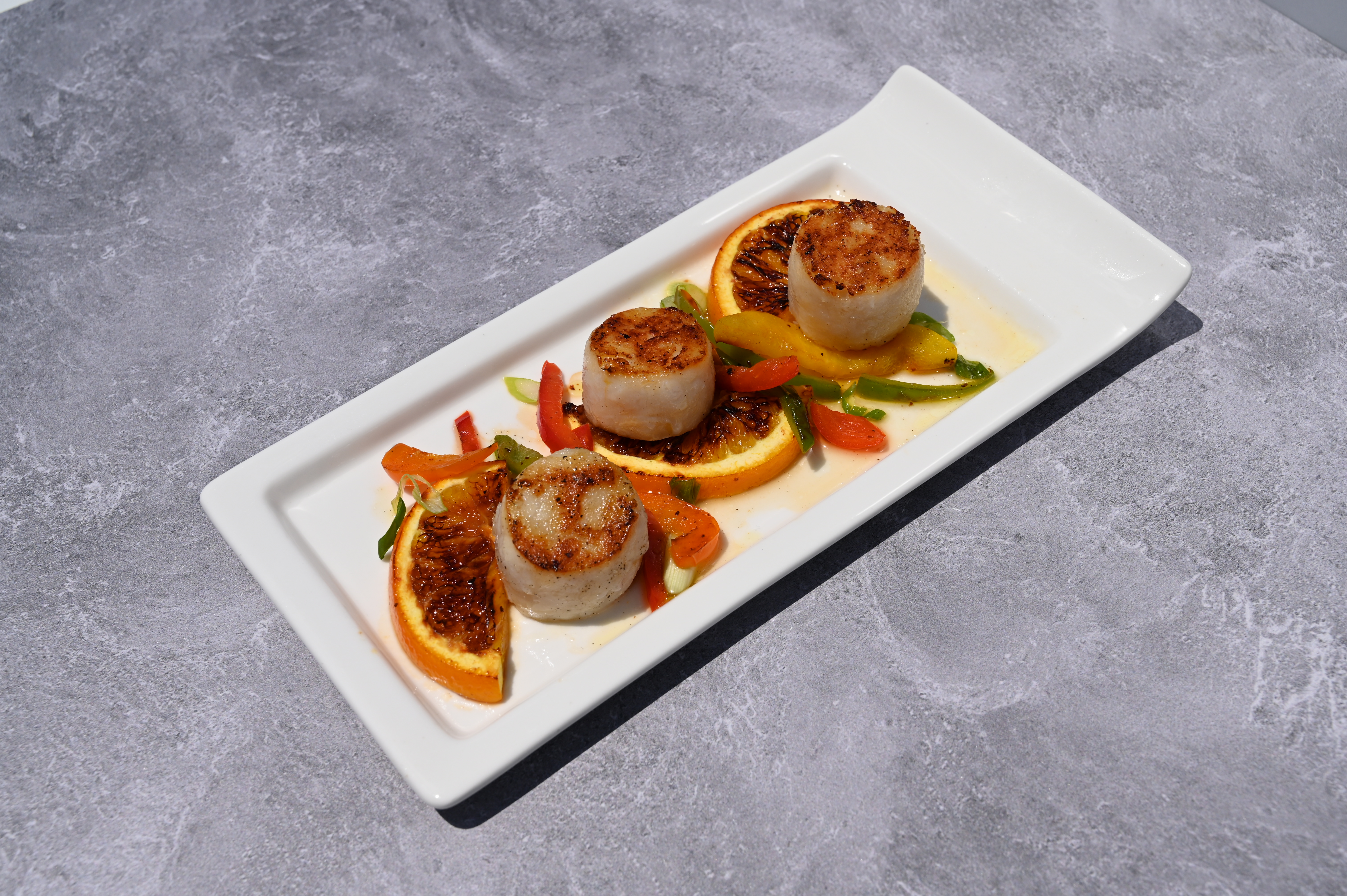 A delicious dish of pan seared scallops