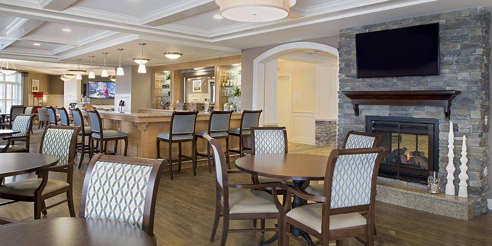 Brightview Arlington Dining Room with Fireplace - Massachusetts Senior Living