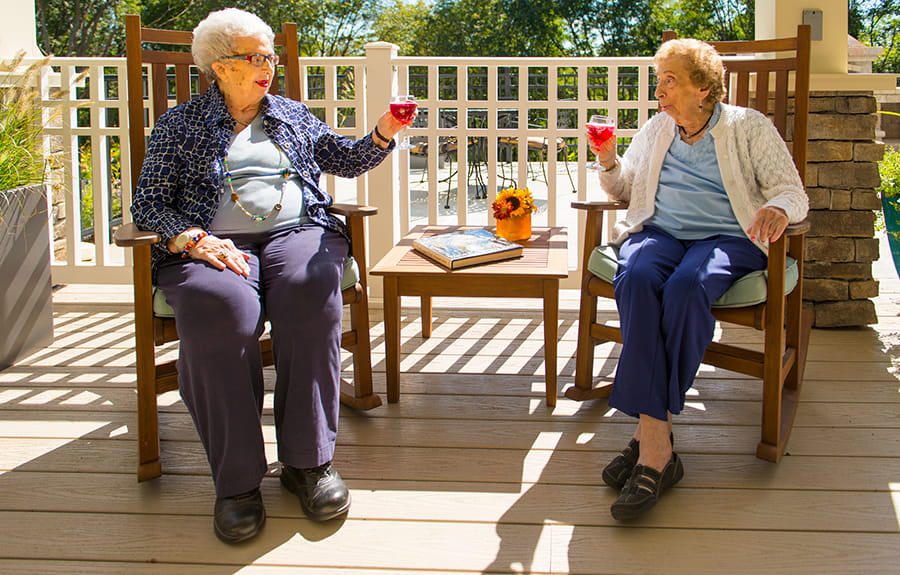 Brightview Assisted Living Residents Toasting on Patio